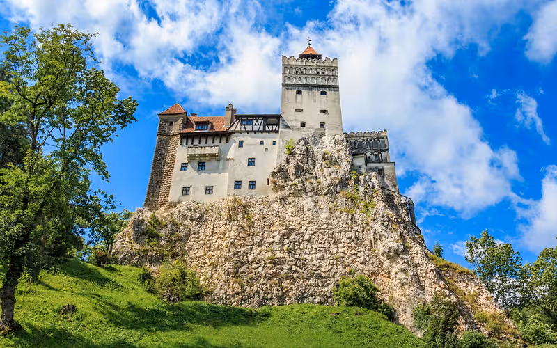 From Bucharest: Bran Castle, Peles Castle, & Brasov Small-Group Guided Tour